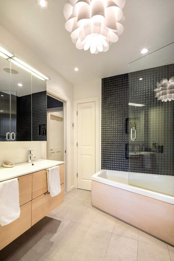 69 Washington Place, Unit 3/4/5 Manhattan, NY 10011 - Photo 11 of 26 a large spacious bathroom with a large tub shower and sink