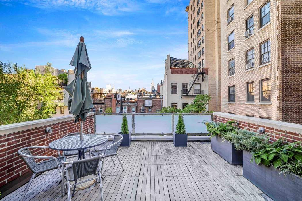 69 Washington Place, Unit 3/4/5 Manhattan, NY 10011 - Photo 20 of 26 a view of a patio on wooden floor