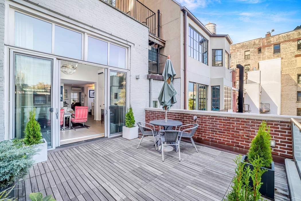 69 Washington Place, Unit 3/4/5 Manhattan, NY 10011 - Photo 22 of 26 a balcony view with a seating space