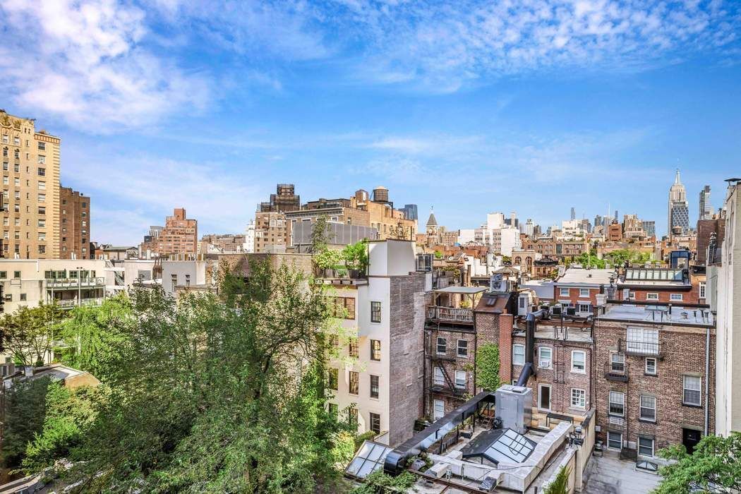 69 Washington Place, Unit 3/4/5 Manhattan, NY 10011 - Photo 23 of 26 a view of a city with tall buildings
