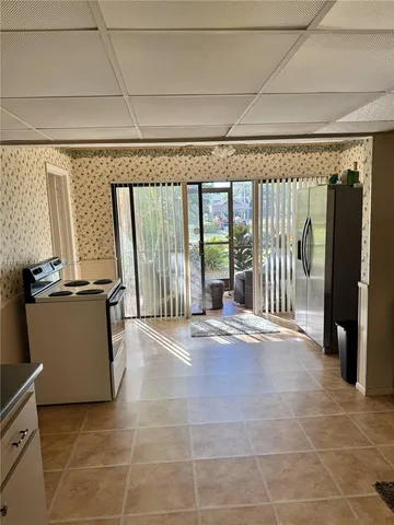 a view of a room with a large window