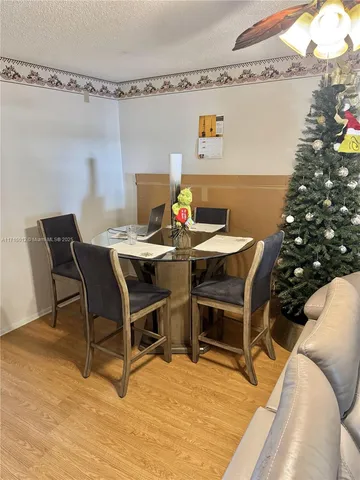 a view of a dining room with furniture