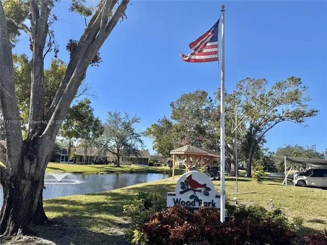 a view of swimming pool with a yard