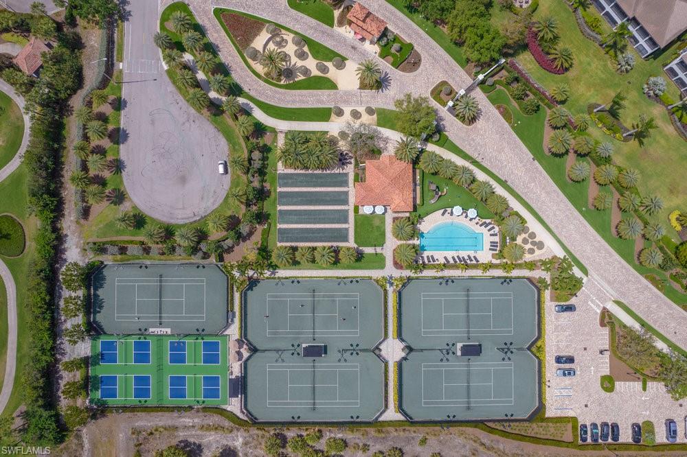 16907 Fairgrove Way, Unit 201 Naples, FL 34110 - Photo 21 of 28 an aerial view of a highlighted house