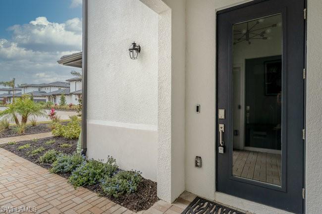 16907 Fairgrove Way, Unit 201 Naples, FL 34110 - Photo 3 of 28