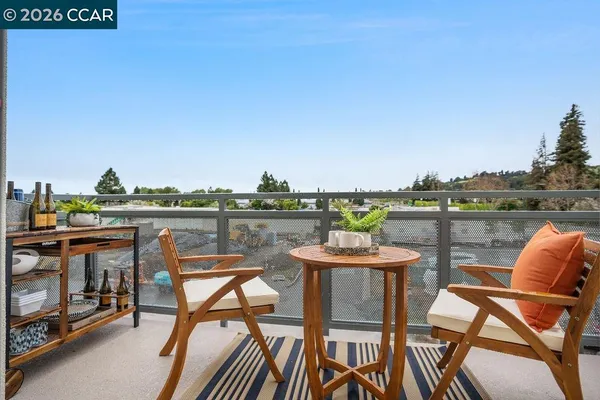 a view of a chairs and table on the terrace