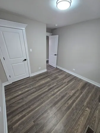 a view of livingroom with furniture and wooden floor