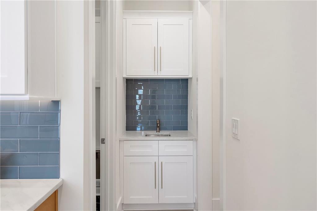 3610 Fleming Drive Cumming, GA 30041 - Photo 15 of 51 a bathroom with a sink and a mirror