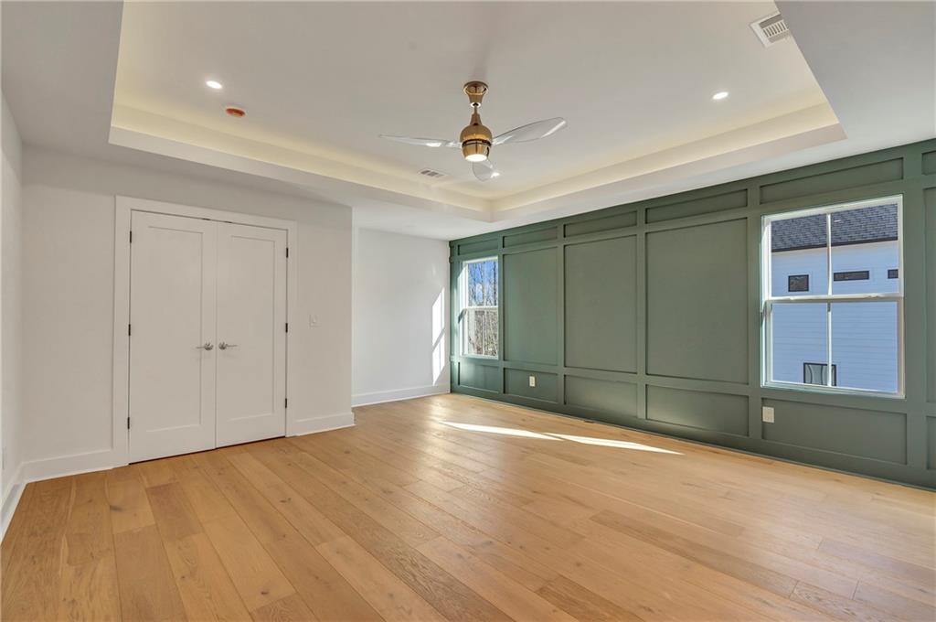 3610 Fleming Drive Cumming, GA 30041 - Photo 18 of 51 a view of livingroom with hardwood floor and ceiling fan