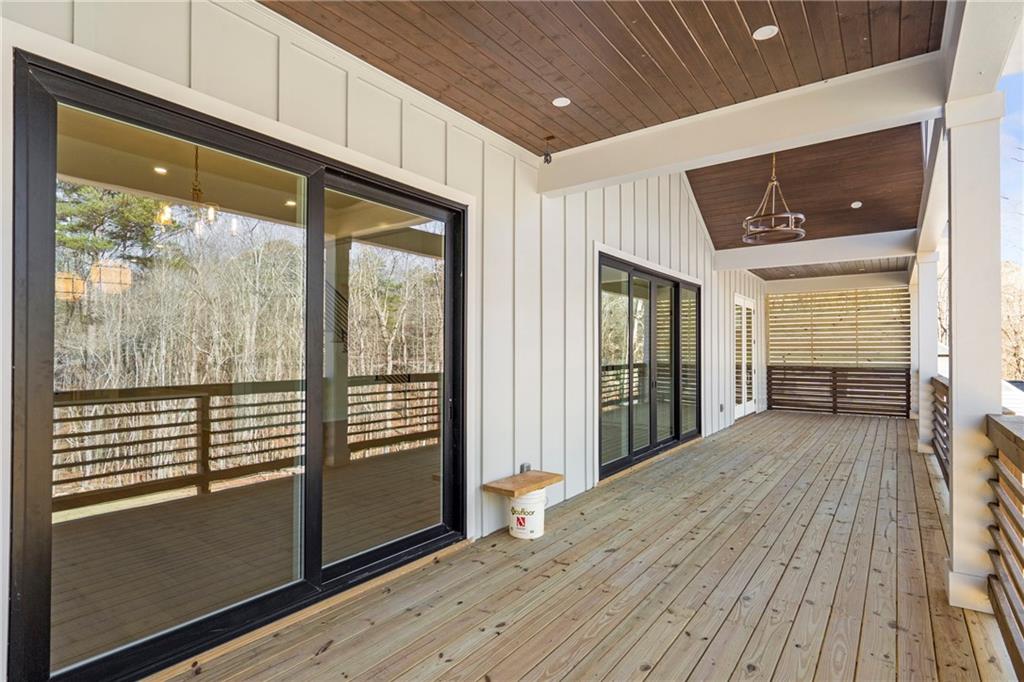 3610 Fleming Drive Cumming, GA 30041 - Photo 28 of 51 a view of a room with wooden floor and doors