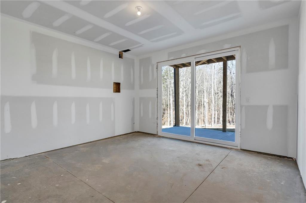3610 Fleming Drive Cumming, GA 30041 - Photo 39 of 51 a view of an empty room with a window