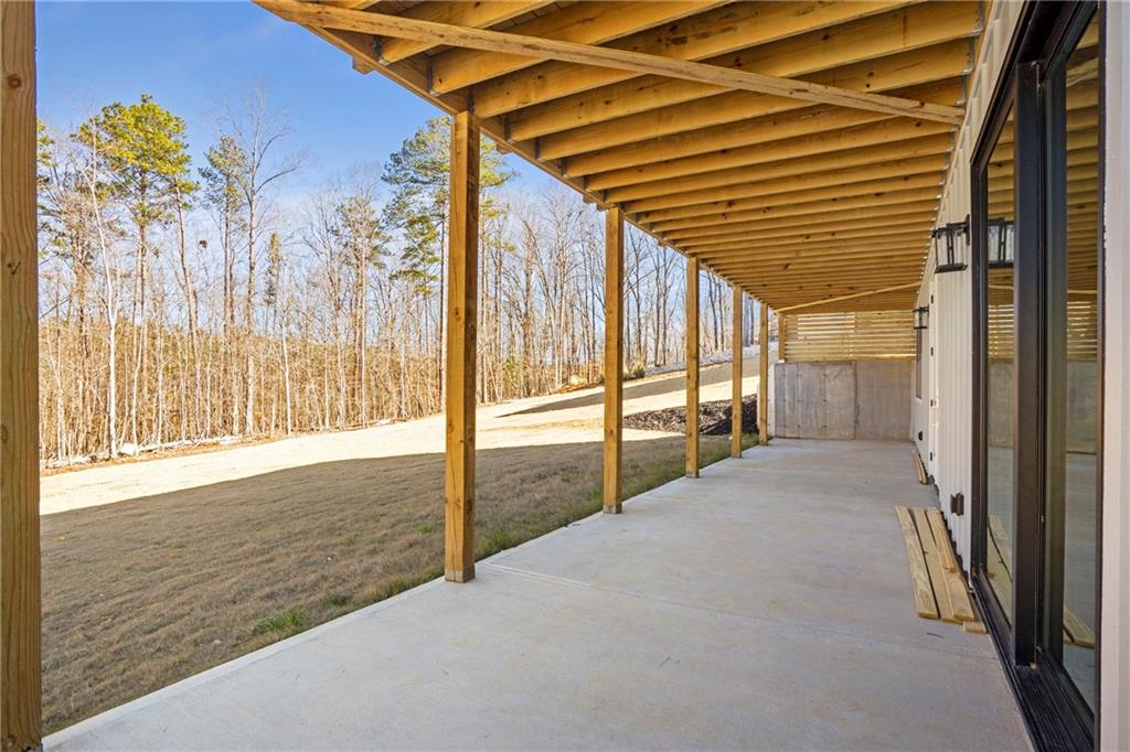 3610 Fleming Drive Cumming, GA 30041 - Photo 40 of 51 a view of a room with window and wooden floor