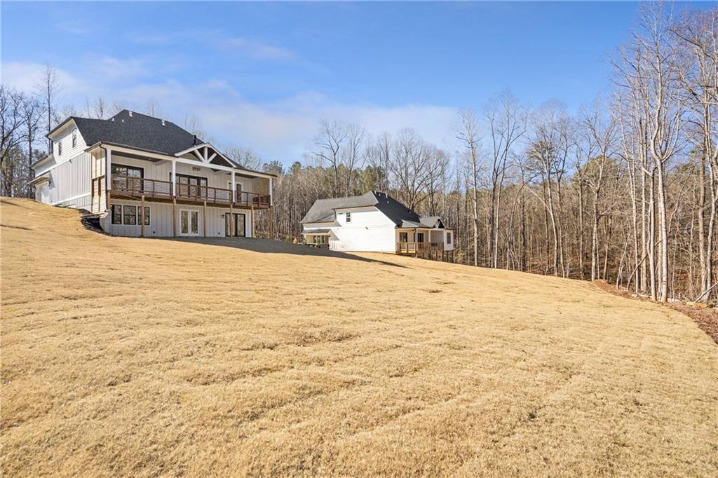 3610 Fleming Drive Cumming, GA 30041 - Photo 42 of 51 a view of residential houses with snow in the background