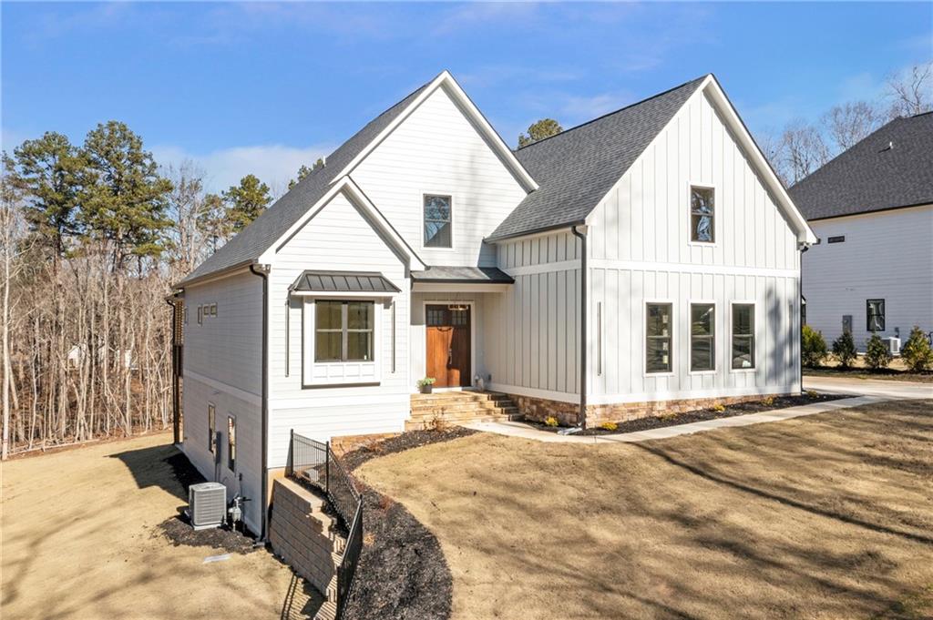 3610 Fleming Drive Cumming, GA 30041 - Photo 45 of 51 a front view of a house with a yard