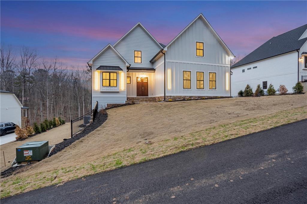 3610 Fleming Drive Cumming, GA 30041 - Photo 51 of 51 a view of a house with a yard and garage