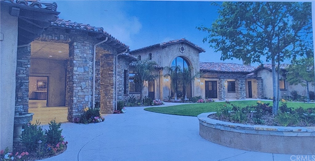 41095 Chaparral Drive Temecula, CA 92592 - Photo 35 of 41 a front view of a house with garden