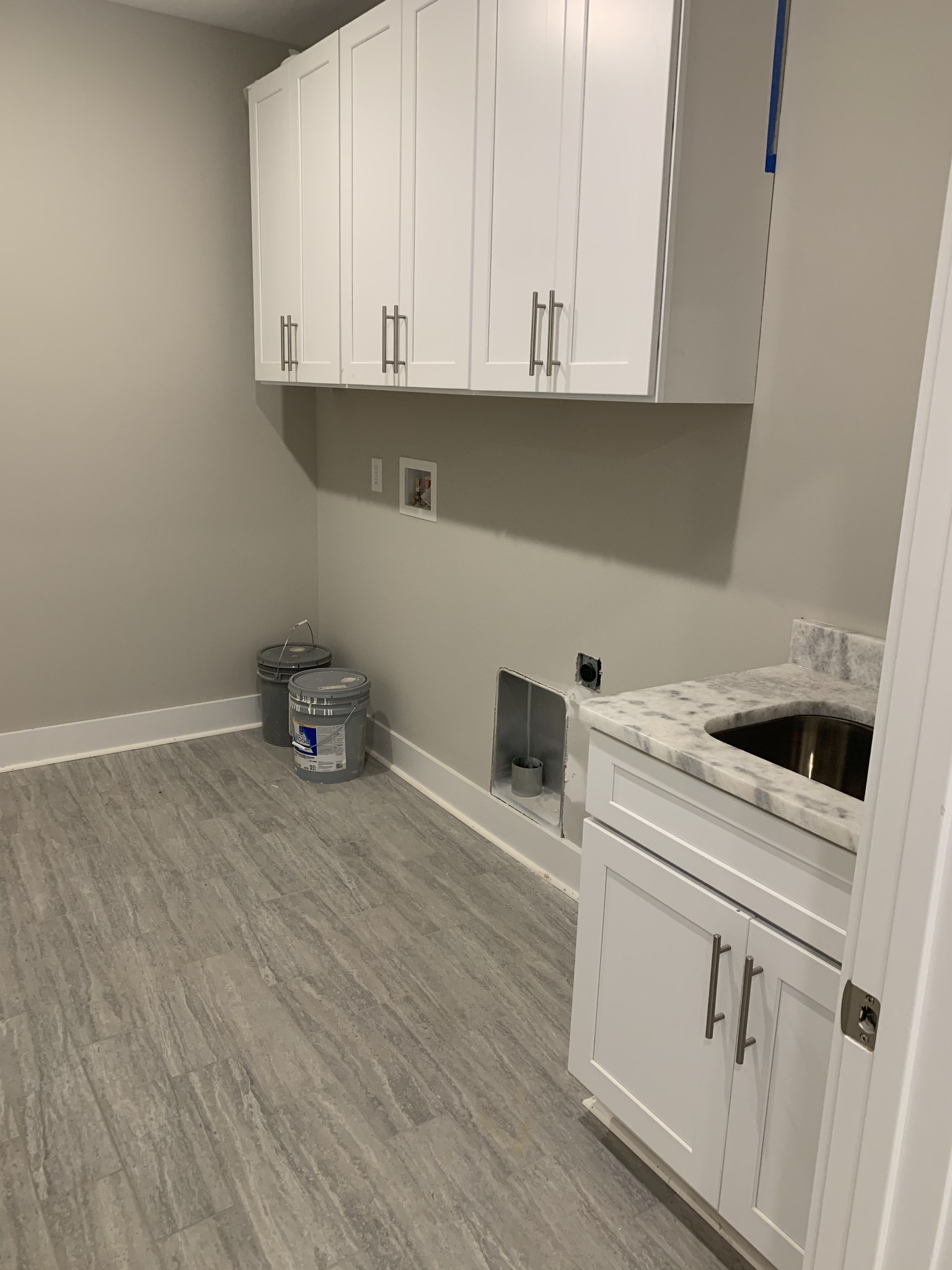 1810 Old Gallatin Road Portland, TN 37148 - Photo 16 of 52 a view of white cabinets and sink
