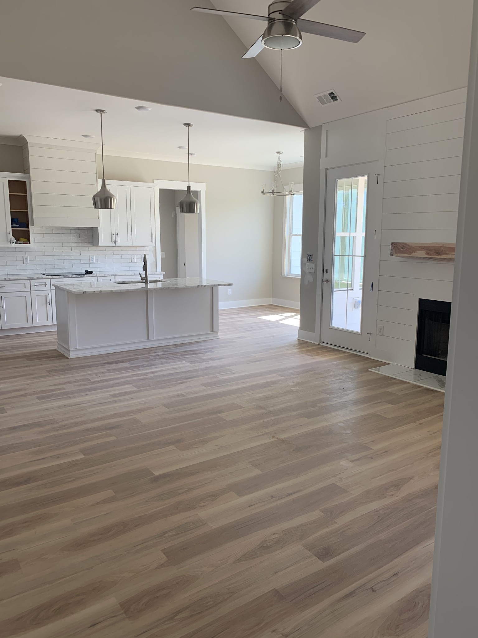 1810 Old Gallatin Road Portland, TN 37148 - Photo 8 of 52 a large kitchen with kitchen island a sink stainless steel appliances and cabinets