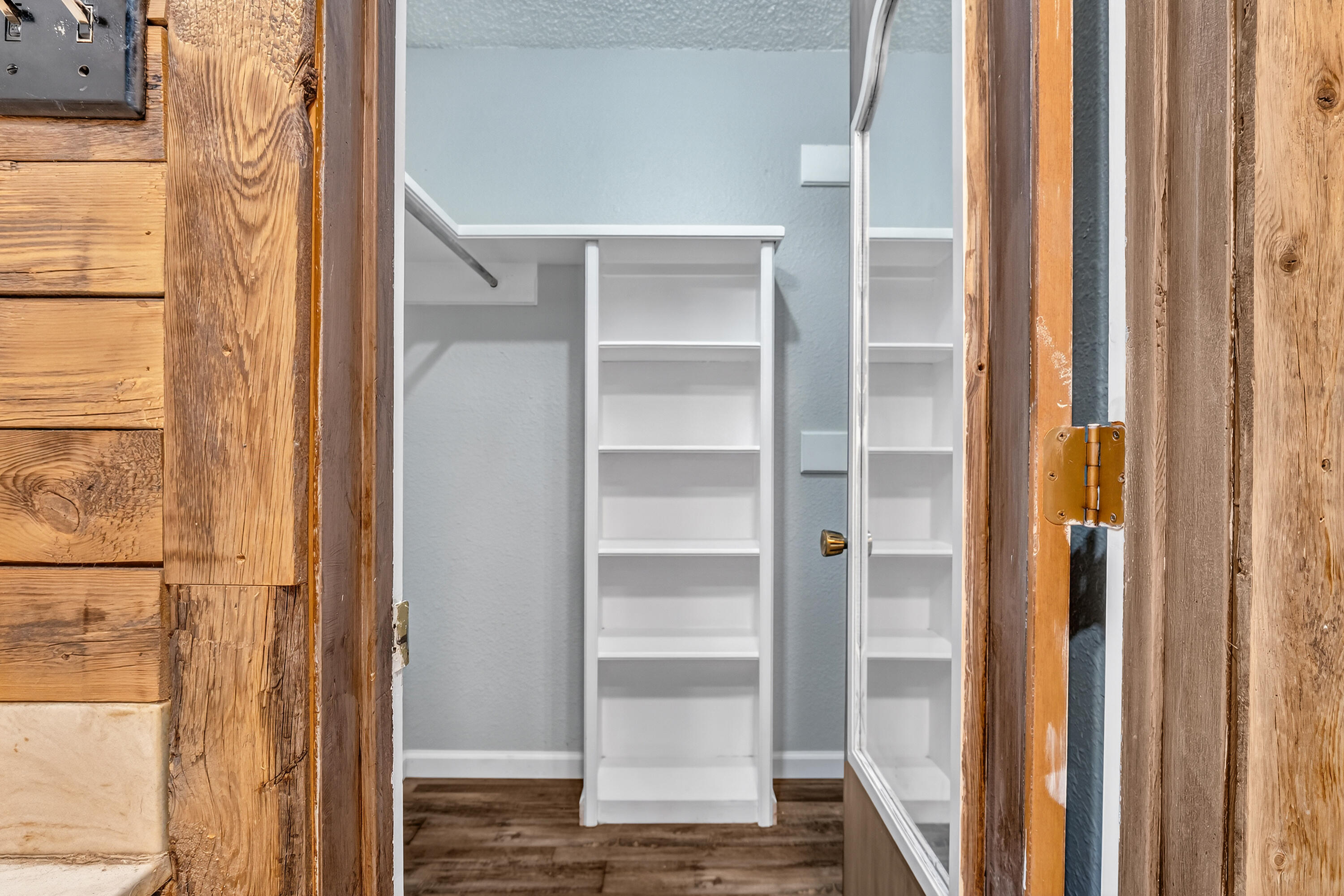 5236 91st Street Lubbock, TX 79424 - Photo 14 of 23 a view of walk in closet with empty racks