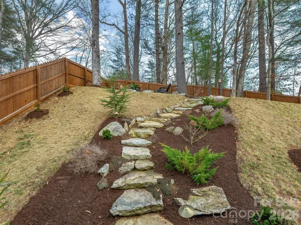 a view of yard covered with snow