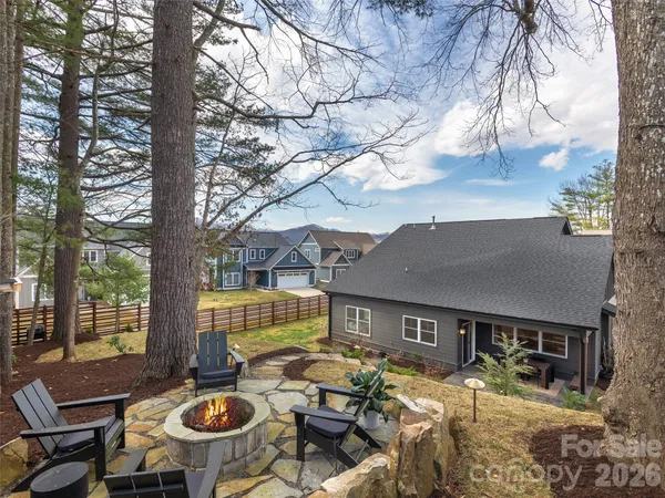 a view of house with outdoor seating space