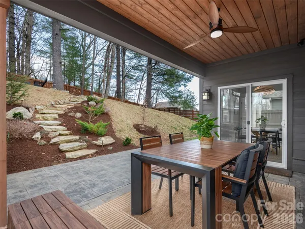 a view of an outdoor dining space with furniture