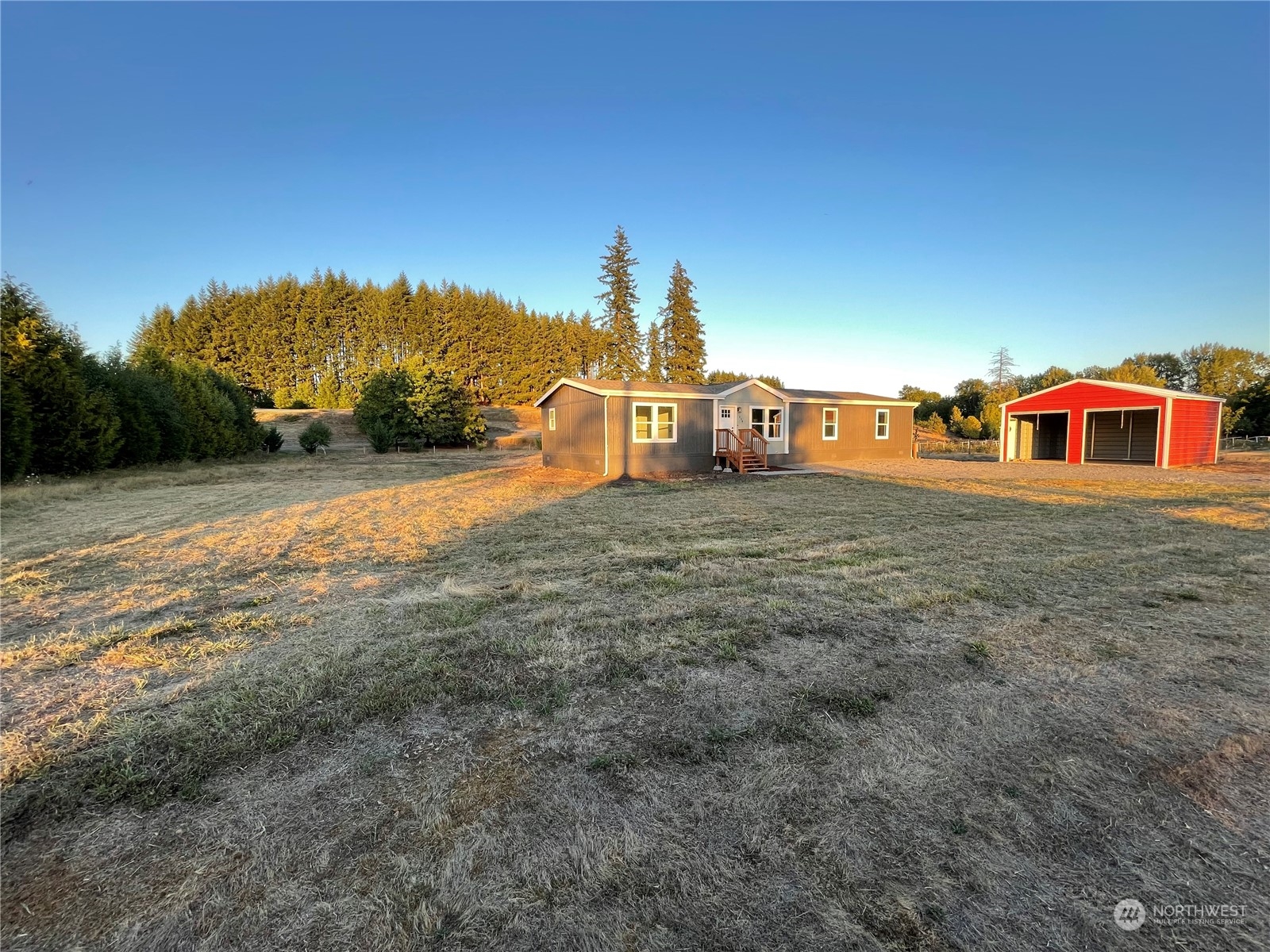 230 Bunker Creek Road Chehalis, WA 98532 - Photo 16 of 19 a view of a house with a yard