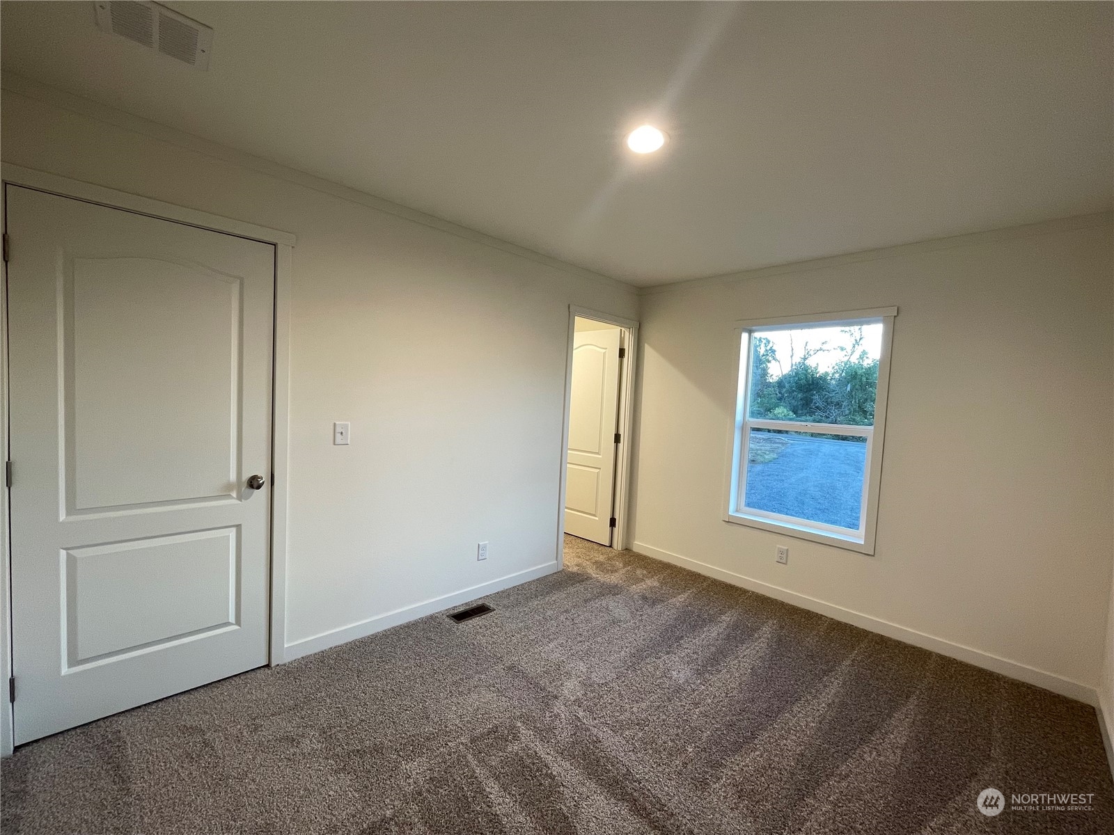 230 Bunker Creek Road Chehalis, WA 98532 - Photo 7 of 19 an empty room with windows