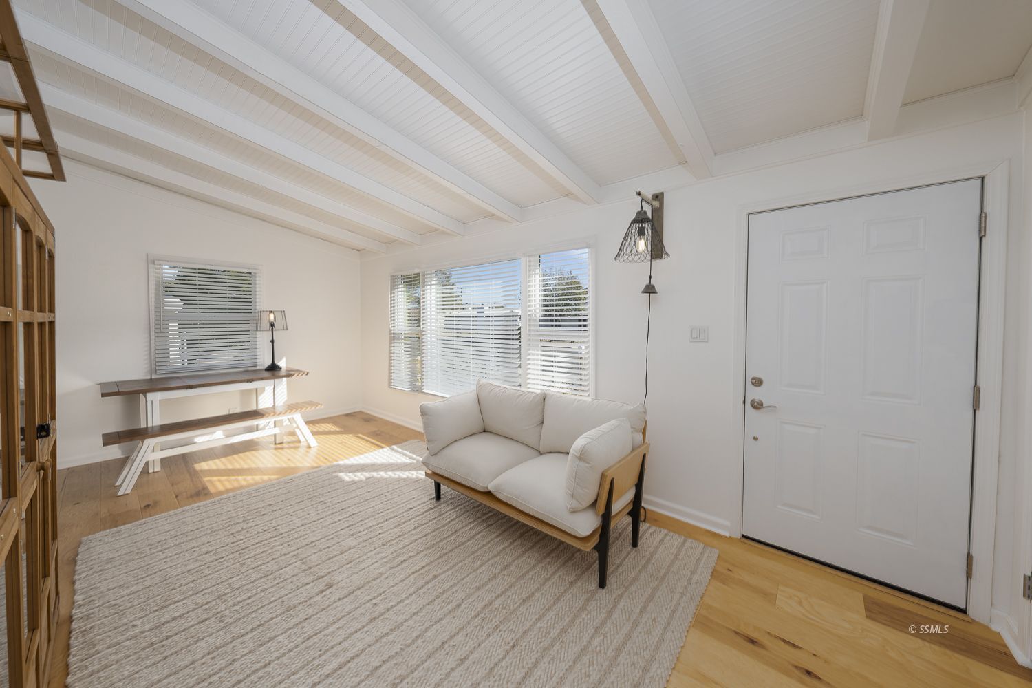 305 North Warner Street Ridgecrest, CA 93555 - Photo 7 of 30 a living room with furniture and a large window