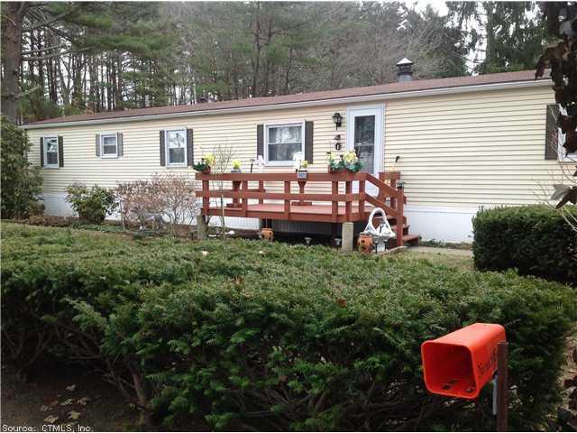 262 North Shore Road Killingly, CT 06241 - Photo 1 of 1 a view of a house with backyard and sitting area