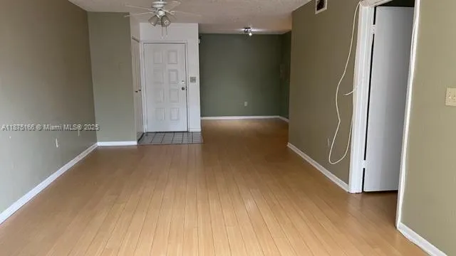 a view of a hallway with entryway