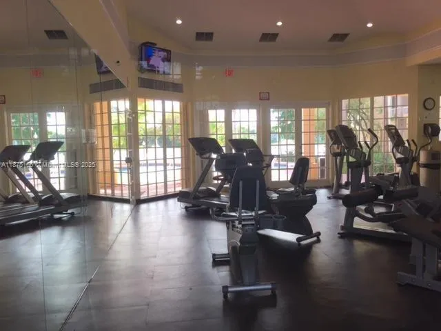a view of a room with gym equipment