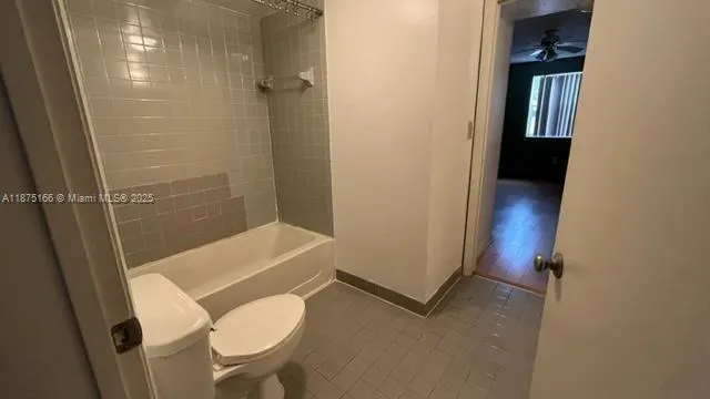a bathroom with a sink and toilet