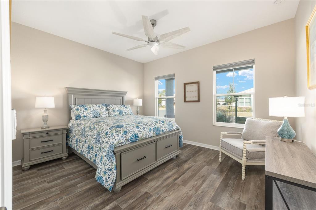 10390 Southwest 99th Street Ocala, FL 34481 - Photo 12 of 48 a bedroom with a bed and a window