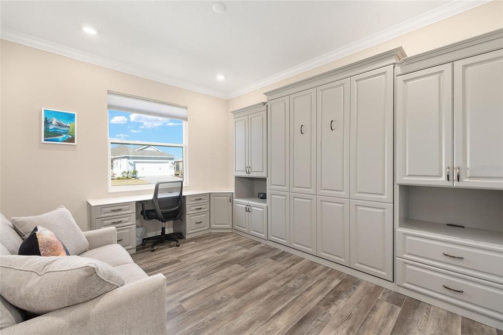 10390 Southwest 99th Street Ocala, FL 34481 - Photo 17 of 48 a living room with furniture and window