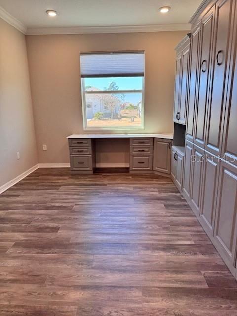 10390 Southwest 99th Street Ocala, FL 34481 - Photo 18 of 48 a view of an empty room with wooden floor and a window