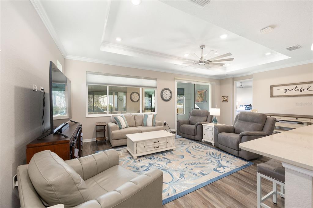 10390 Southwest 99th Street Ocala, FL 34481 - Photo 26 of 48 a living room with furniture and a large window