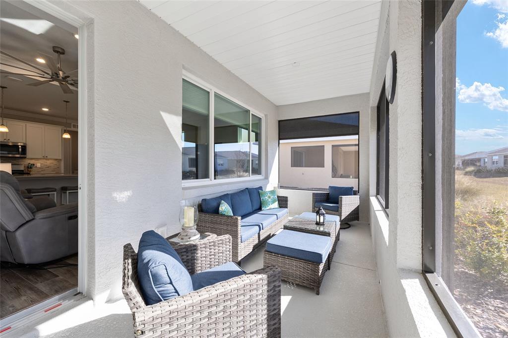 10390 Southwest 99th Street Ocala, FL 34481 - Photo 47 of 48 a living room with furniture and a window