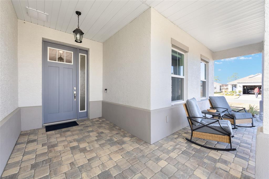 10390 Southwest 99th Street Ocala, FL 34481 - Photo 8 of 48 a view of a livingroom with furniture and a window