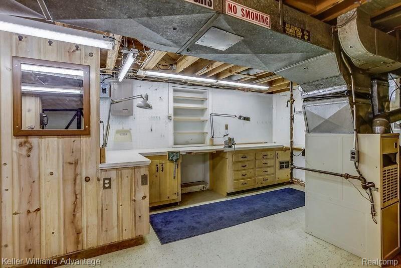 11323 Inkster Road Livonia, MI 48150 - Photo 20 of 24 A man cave dream! A workshop in the basement.