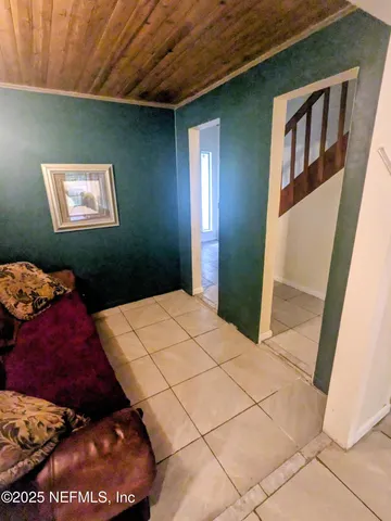 a view of a livingroom with furniture and a fireplace