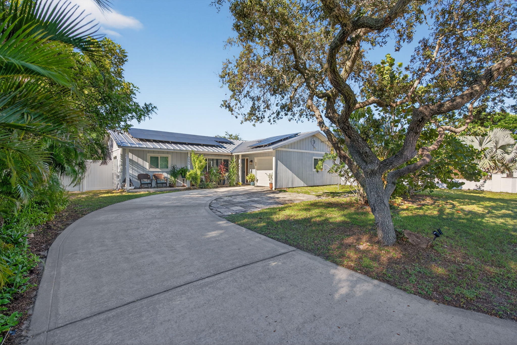 5095 Southeast Manatee Terrace Stuart, FL 34997 - Photo 1 of 58 Front of home 1b