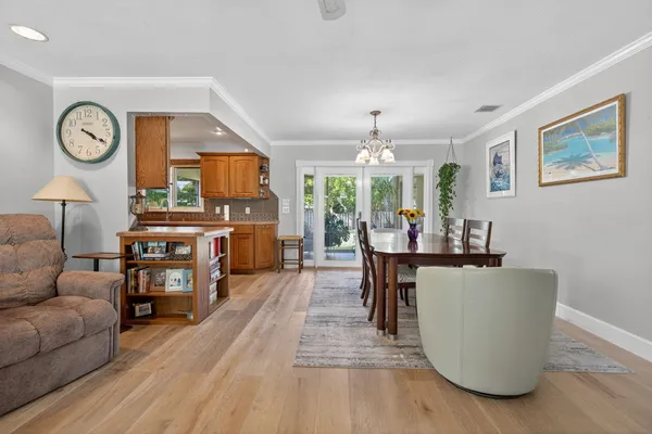a kitchen with stainless steel appliances granite countertop refrigerator a sink and dishwasher