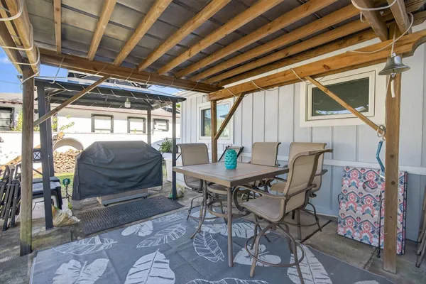 a backyard of a house with lots of green space