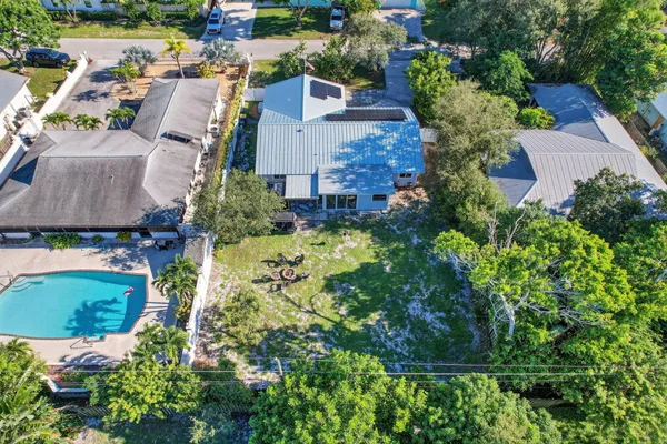a backyard of a house with lots of green space