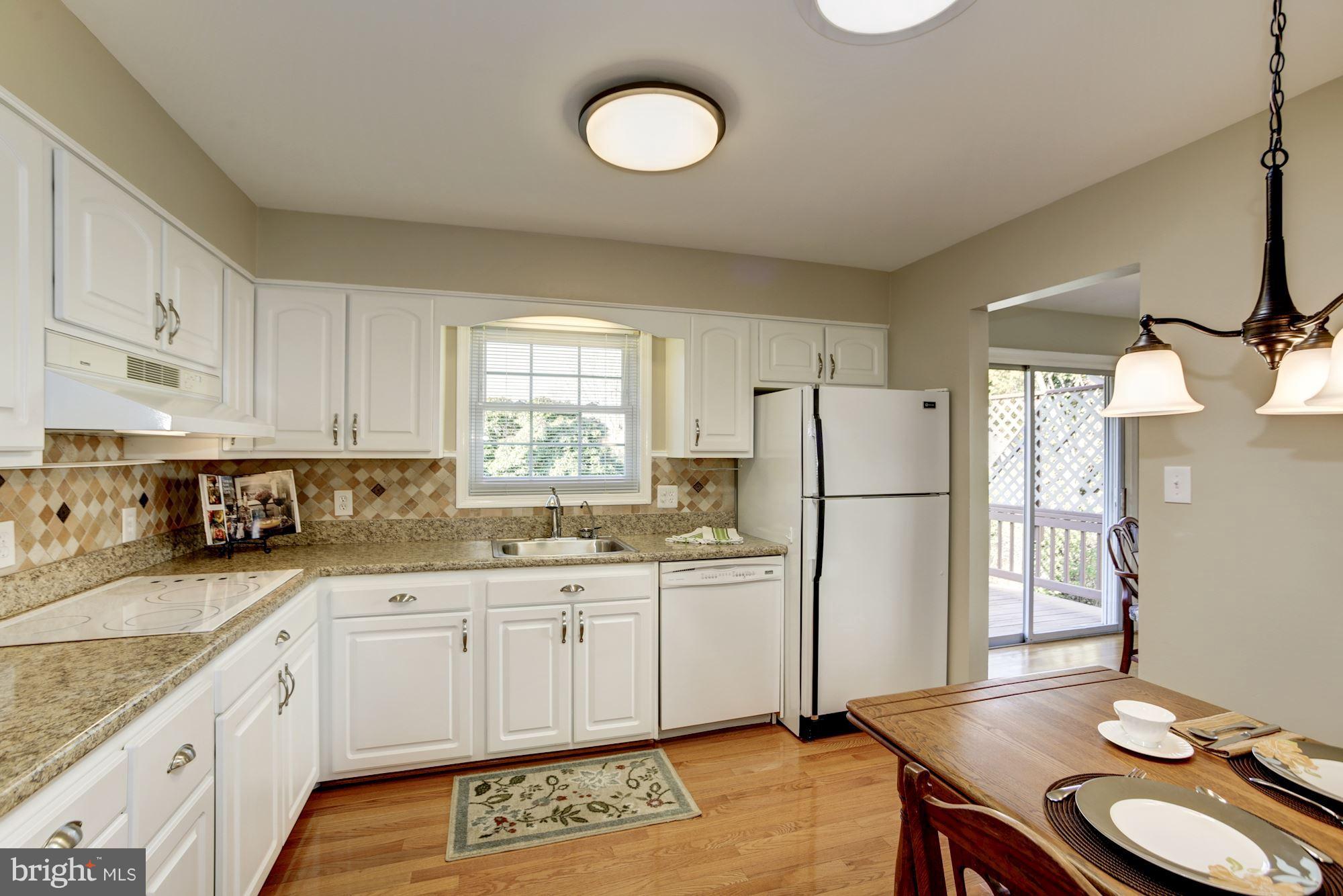 3609 Colony Road Fairfax, VA 22030 - Photo 7 of 30 Center skylight floods the kitchen with light