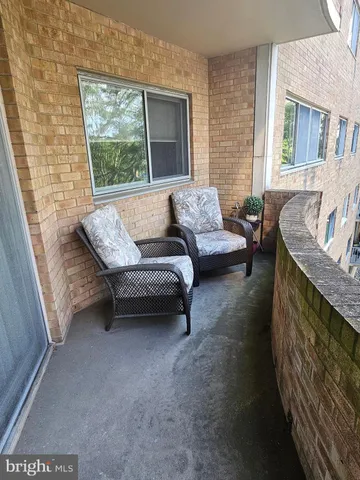 a view of yard with tree and outdoor seating