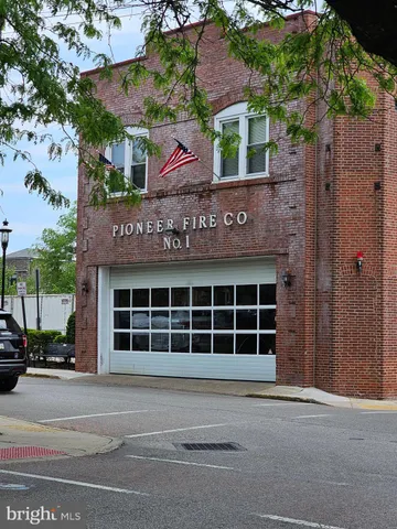 a kitchen with a stove and cabinets