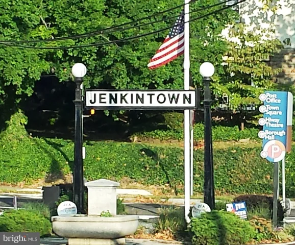 a view of an building with sitting area