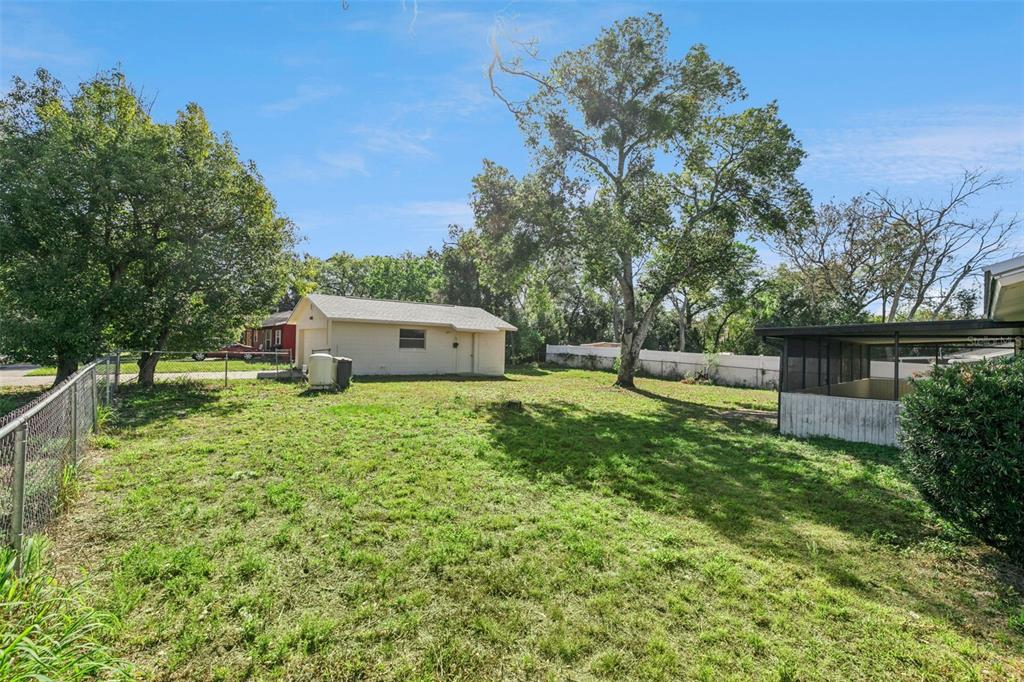 111 Amigos Road DeBary, FL 32713 - Photo 27 of 29 a house view with a garden space